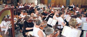 Einzigartiger Klangkörper. Profi- wie Amateurmusiker spielen zur Orchesterwoche zusammen – hier eine Probe in der Friedenskirche.