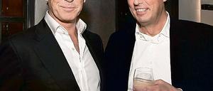 Pierce Brosnan (l.) und Studio-Chef Carl L. Woebcken auf der Filmparty.