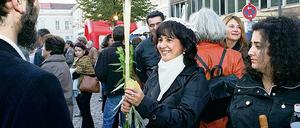 Beim Laubhüttenfest in Erinnerung an die Wüstenwanderung beim Auszug der Juden aus Ägypten berühren Gläubige einen Strauß aus vier Pflanzenarten: ein Palmzweig, drei Myrtenzweige und zwei Bachweidenzweige sowie eine Zitronatzitrone.