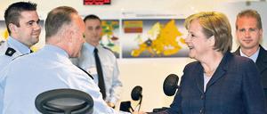 Bundeskanzlerin Angela Merkel gestern im Präsidium der Bundespolizei.