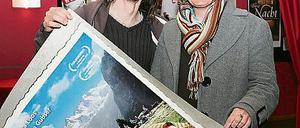 Tamara Staudt und Jörg Hauschild mit Anna Loos in der Hand.