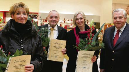 Frauke Käsler, Harald Kirchfeld, Susanne von Hein und AGIP-Vorsitzender Wolfgang Cornelius (v. l.).