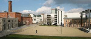 Es fügt sich ein: Das Parkhaus auf dem Kultur- und Gewerbeareal an der Schiffbauergasse  das weiß gestrichene Gebäude vor dem Oracle-Hochhaus  verfügt zwar über 343 Parkplätze und ist somit kein kleines Haus. Doch es respektiert die umliegende Bebauung und die Größenverhältnisse der Gesamtanlage, wie dieses Foto verdeutlicht.
