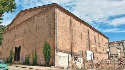 Denkmal. Auch das von 1939 stammende Atelierhaus am Knick der Wollestraße wird zum Wohnhaus umgebaut. Das Bild rechts zeigt das Areal aus der Luft.