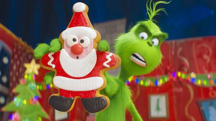 Der Grinch in einer Szene des Kinofilms "Der Grinch". Der Film läuft seit Ende November in den deutschen Kinos.