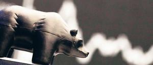 Abwärts. An der Börse steht der Bär für sinkende Kurse. 2011 verlor der Dax 14,7 Prozent. Foto: picture-alliance/dpa