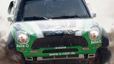 Kühl im Chaos. Stéphane Peterhansel in seinem Mini. Foto: Reuters