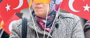 Integrationspräsident? Christian Wulff machte Integration zum Thema seiner Amtszeit. Bei den Grünen herrscht die Vorstellung, dass Joachim Gauck sich in diese Linie stellt. Einige aber sind skeptisch. Foto: Friso Gentsch/dpa