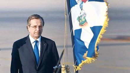 Zum Wohle des Staates. Der griechische Ministerpräsident Antonis Samaras muss den Haushalt sanieren. Ob das gelingt, sehen viele im Lande skeptisch. Foto: Yorgos Karahalis/Reuters