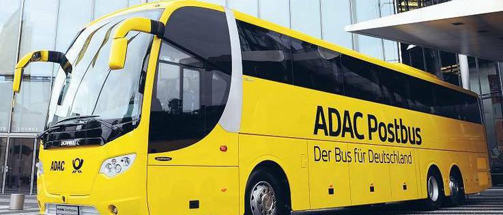 Abfahrbereit. Vor der Konzernzentrale der Deutschen Post in Bonn werden die Busse nun häufiger stehen. Foto: dpa