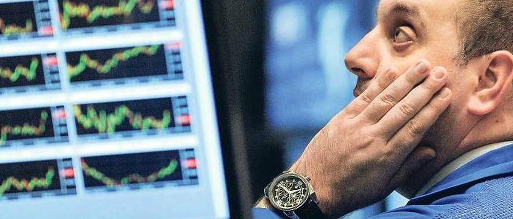Reine Nervensache. Börsianer in aller Welt sind in diesen Tagen hin- und hergerissen zwischen Skepsis und Optimismus. Die Berichtssaison ist gut angelaufen, aber die besseren Prognosen der Unternehmen sind in den meisten Kursen schon verarbeitet. Foto: dpa