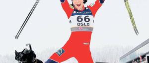 Ski-Springerin. Marit Björgen konnte bereits drei Goldmedaillen bejubeln.
