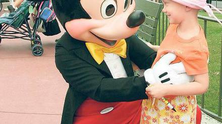 Lieber zu Mickey. Orlando hatte 2011 mit 54, 3 Millionen mehr Besucher als New York. Doch wenige entdecken die Stadt. Viele gehen gleich in die Vergnügungsparks. Foto: Reuters