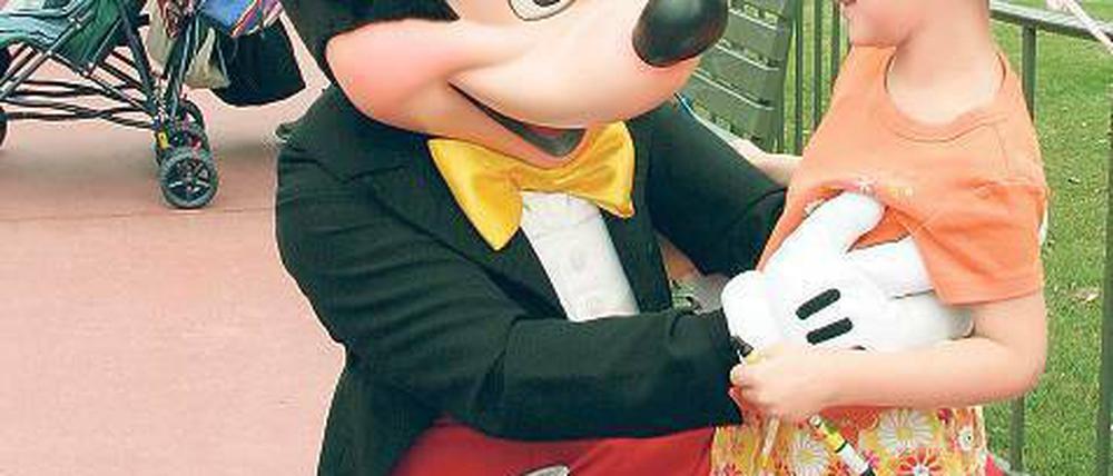 Lieber zu Mickey. Orlando hatte 2011 mit 54, 3 Millionen mehr Besucher als New York. Doch wenige entdecken die Stadt. Viele gehen gleich in die Vergnügungsparks. Foto: Reuters