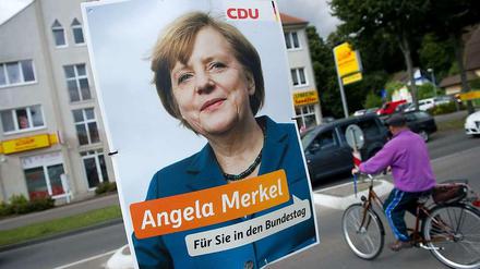 Angela Merkel auf einem Wahlplakat.