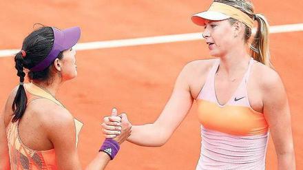 Hartes Los. Scharapowa (r.) war gegen Muguruza am Rand einer Niederlage.