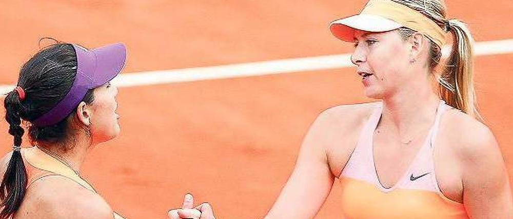 Hartes Los. Scharapowa (r.) war gegen Muguruza am Rand einer Niederlage.