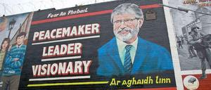 Huldigung. Als „Friedensstifter. Führer. Visionär“ wird Sinn-Fein-Chef Gerry Adams auf diesem Wandbild in der überwiegend von Katholiken bewohnten Falls Road in Belfast gewürdigt.