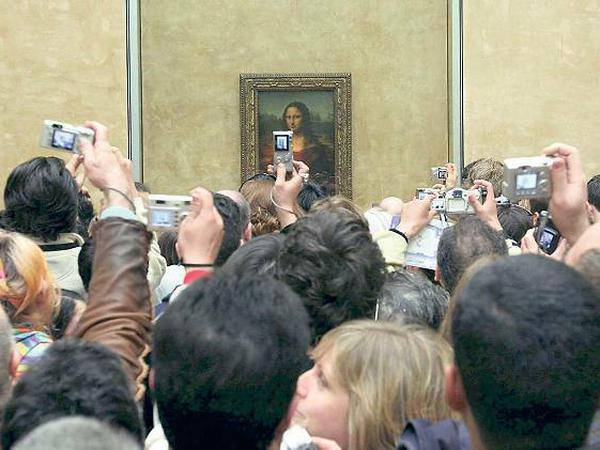 Die meisten wollen Leonardo da Vincis "Mona Lisa" sehen - oder zumindest fotografieren.