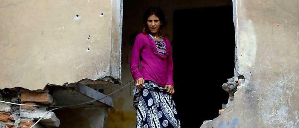 Eine junge Frau aus Syrien hat mit ihrer Familie Obdach in einer Ruine in Istanbul gefunden.