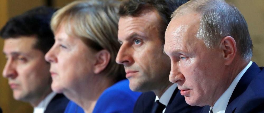 Fortschritte im Ukraine-Konflikt: Selenskyj, Merkel, Macron und Putin nach dem Gipfel in Paris