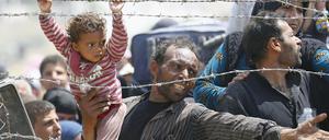 Flüchtlinge an der türkischen Grenze. Das Bild stammt vom Juni.