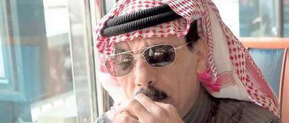 Tradition und Moderne. Omar Souleyman mit Kufiya in einem New Yorker Diner.