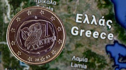 Euro und Eule. Für die Griechen entscheidet sich in den kommenden Wochen, ob sie in der Währungsunion bleiben.