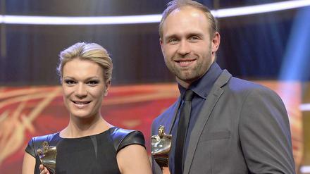 Maria Höfl-Riesch und Robert Harting (rechts).