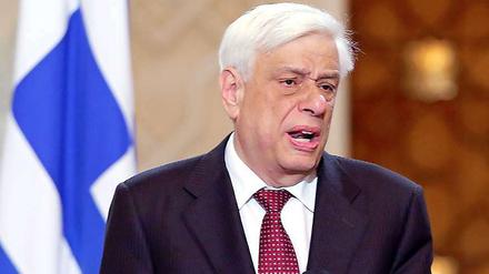 Der griechische Präsident Prokopis Pavlopoulos sichert zu, sein Land wolle so bald wie möglich alle Schulden zurückzahlen.