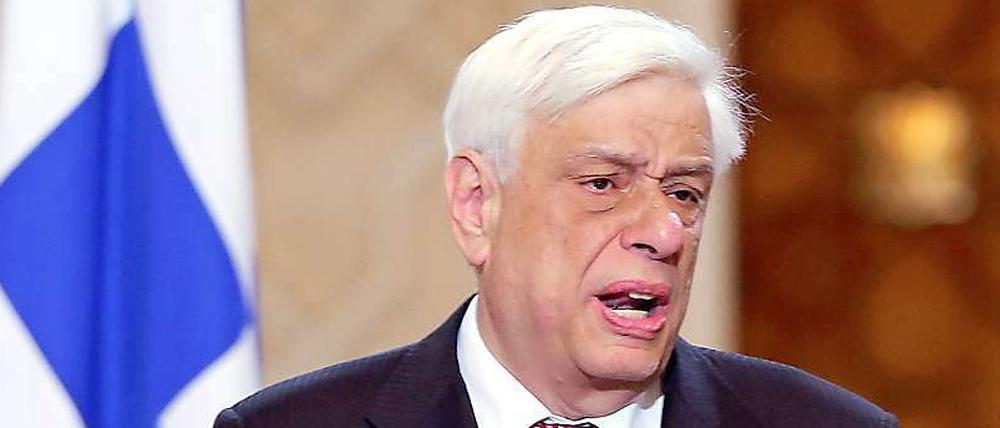 Der griechische Präsident Prokopis Pavlopoulos sichert zu, sein Land wolle so bald wie möglich alle Schulden zurückzahlen.