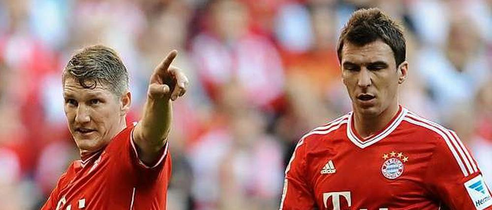 Beide nicht dabei: Bayern München muss bzw. will im Pokalfinale ohne Bastian Schweinsteiger (l.) und Mario Mandzukic auskommen.