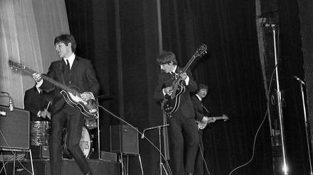 Die Beatles, Anfang 1964 in Paris.