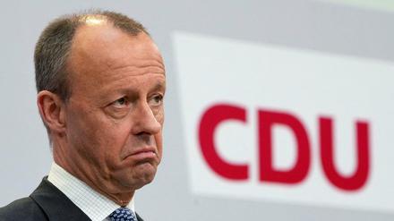 Chairman of the German Christian Democratic Party (CDU) Friedrich Merz looks on as he addresses the media during a news conference at the party&amp;apos;s headquarters in Berlin, Germany March 28, 2022. Michael Sohn/Pool via REUTERS TPX IMAGES OF THE DAY