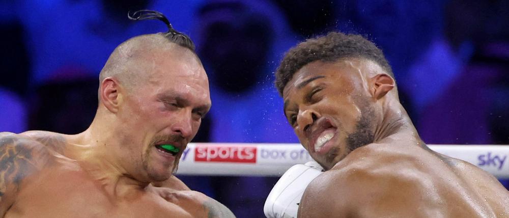 Oleksandr Usyk (links) setzte sich in einem spannenden Kampf gegen Anthony Joshua durch.
