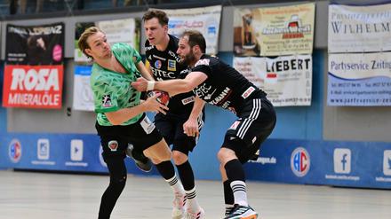 Mathias Gidsel (l.) verstärkt die Füchse seit dieser Saison.