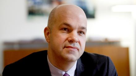 FILE PHOTO: Marcel Fratzscher, chairman of the German Institute for Economic Research (DIW), speaks during an interview with Reuters in his office in Berlin, Germany, March 7, 2016. REUTERS/Fabrizio Bensch/File Photo