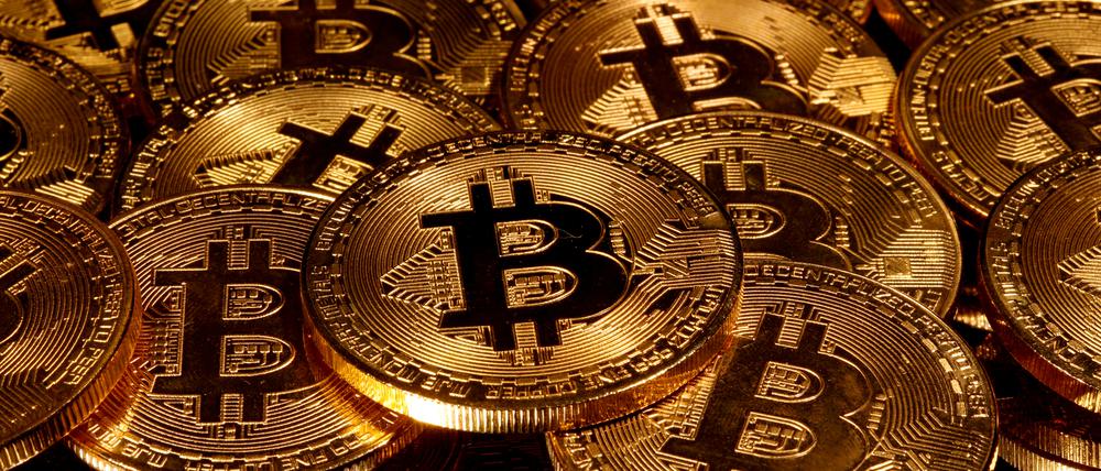 Gute Geldflut? Die Kryptowährung Bitcoin soll als Absicherung vor Inflation dienen. Ob das stimmt, ist umstritten.