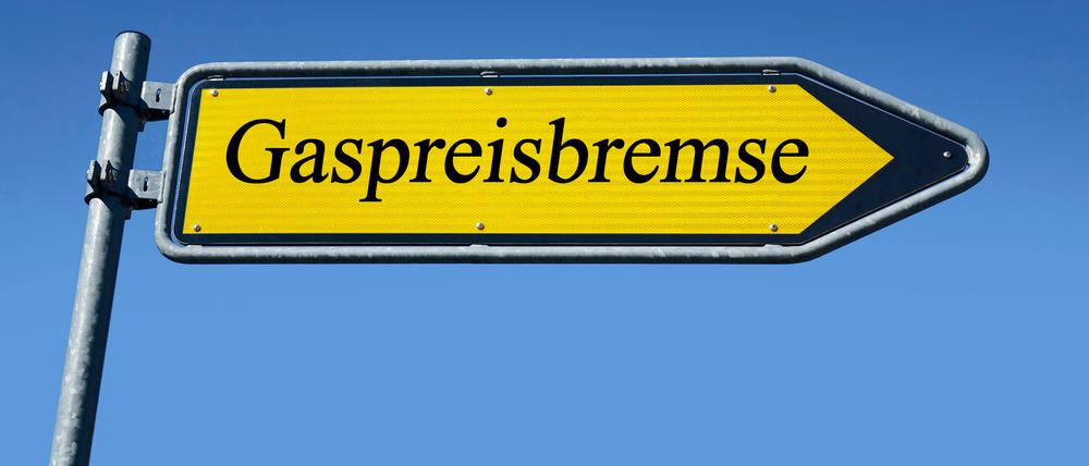 Ein Verkehrsschild trägt die Aufschrift „Gaspreisbremse“.  