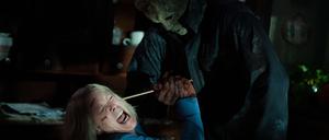 Jamie Lee Curtis as Laurie Strode and Michael Myers (aka The Shape) in HALLOWEEN ENDS, directed by David Gordon Green
