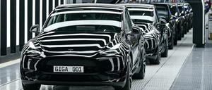FILE PHOTO: Model Y cars are pictured at theTesla Gigafactory for electric cars in Gruenheide, Germany, March 22, 2022. Patrick Pleul/Pool via REUTERS/File Photo