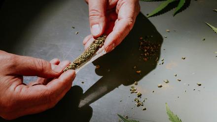 Person holding joint.