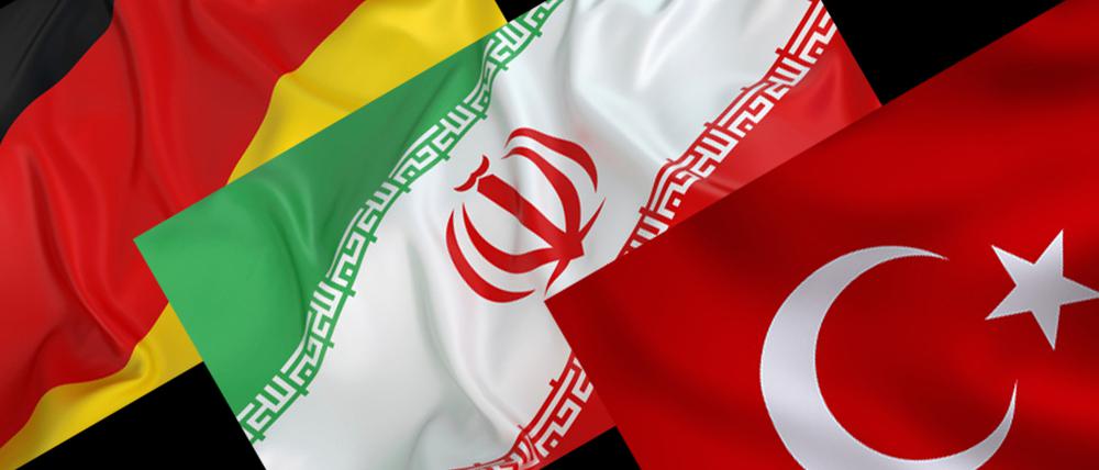 Flaggen Deutschlands, des Iran und der Türkei