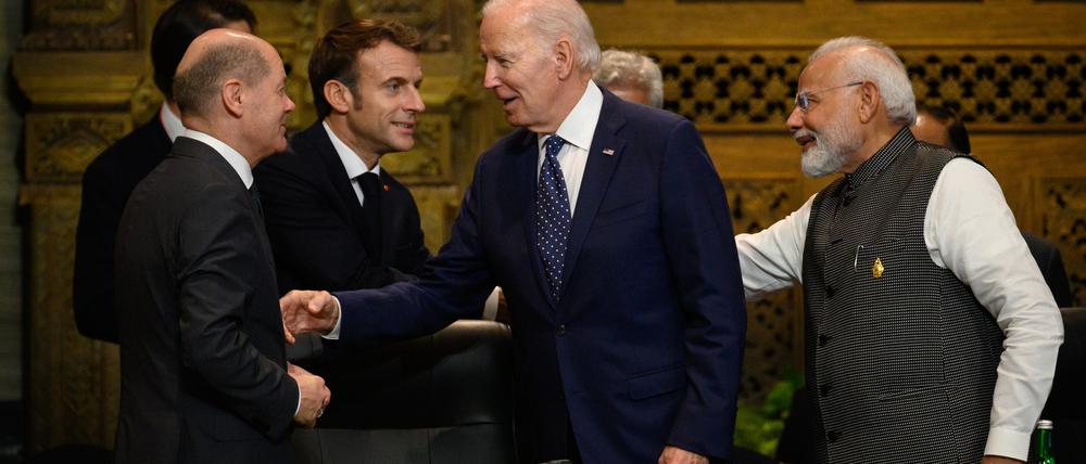 Bundeskanzler Olaf Scholz (v.l.n.r.), Präsident Emmanuel Macron, Präsident von Frankreich, Joe Biden, US-Präsident und der indische Premierminister Narendra Modi.