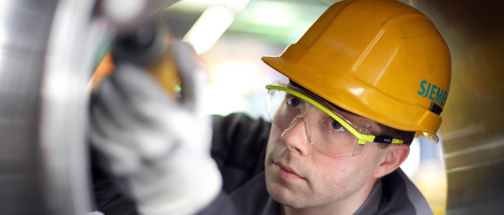Ein Mitarbeiter bei Siemens Power Generation.