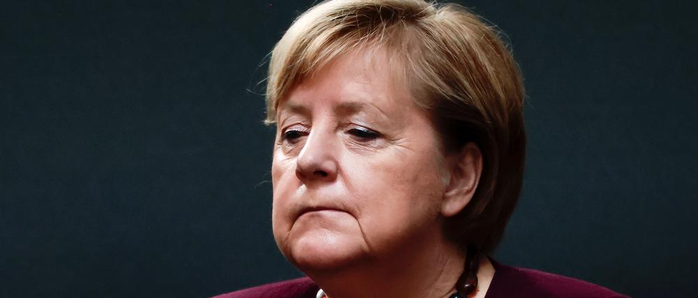 Germany's acting Chancellor Angela Merkel sits on the guest tribune during the inaugural session of the German lower house of Parliament Bundestag in Berlin, Germany, October 26, 2021. REUTERS/Hannibal Hanschke