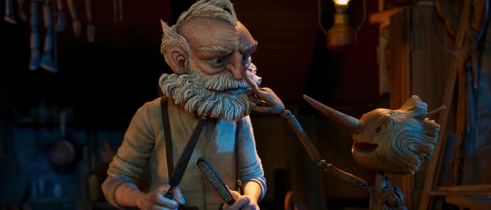 Guillermo del Toro's Pinocchio - (L-R) Gepetto (voiced by David Bradley) and Pinocchio (voiced by Gregory Mann). Cr: Netflix © 2022