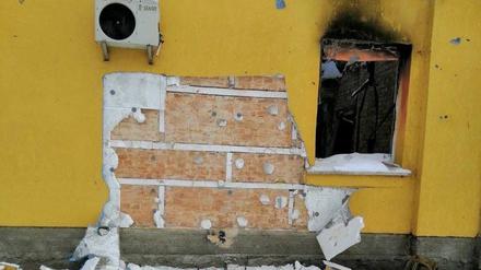 Eine Stelle an einer Hauswand im Kiewer Vorort Hostomel. Es fehlt: Ein Werk von Banksy.