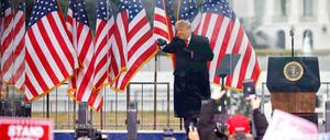 FILE PHOTO: U.S. President Donald Trump gestures at the end of his speech during a rally to contest the certification of the 2020 U.S. presidential election results by the U.S. Congress, in Washington, U.S, January 6, 2021. REUTERS/Jim Bourg/File Photo