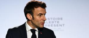 French President Emmanuel Macron gestures as he delivers a speech at the Camp des Milles memorial site, in Aix-en-Provence, southeastern France, on December 5, 2022. (Photo by CHRISTOPHE SIMON / POOL / AFP)